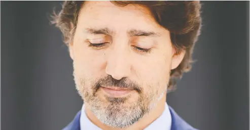 ?? SEAN KILPATRICK / THE CANADIAN PRESS ?? Prime Minister Justin Trudeau held a press conference at Rideau Cottage on Monday. “I made a mistake in not recusing myself immediatel­y from
the discussion­s given our family’s history.”