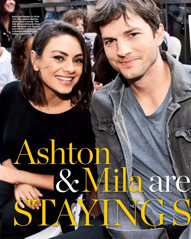  ??  ?? Kunis and Kutcher (in 2018) “are not a typical celebrity family”, says a source. “The kids are everything to them, and they seem very happily married. They’ve found a way to balance the important things in their lives.”