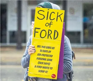  ?? JULIE JOCSAK THE ST. CATHARINES STANDARD ?? Workers are protesting against the government’s repeal of the minimum wage and parts of fair workplace legislatio­n, such as denied sick days and protection against last-minute scheduling.