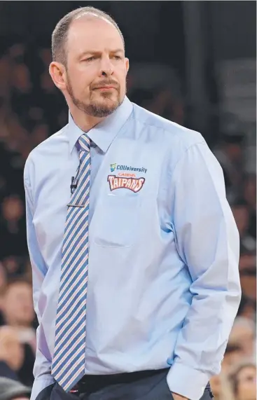  ?? Picture: AAP ?? MILESTONE MOMENT: Taipans’ coach Aaron Fearne chalked up 250 games as a coach in the NBL on Saturday, with a win from his side and kudos from players for his approach this season.