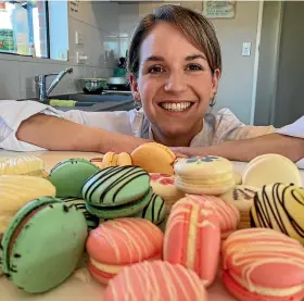  ?? ESTHER ASHBYCOVEN­TRY/STUFF ?? Sophie Lloyd with a fresh batch of macarons she made for the Mother’s Day Market at the Timaru Artisan Farmers’ Market today.