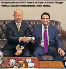  ??  ?? Image tweeted by MP Jami-Lee Ross of Simon Bridges with Auckland businessma­n Yikun Zhang.