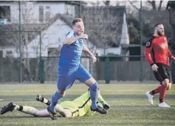  ??  ?? Jamie Darlow celebrates his equaliser for Whittlesey Athletic at Netherton United.