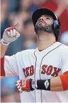  ?? MICHAEL DWYER/ASSOCIATED PRESS ?? Boston’s J.D. Martinez celebrates his two-run home run in the fifth inning of a 4-2 victory by the Red Sox over the visiting White Sox.