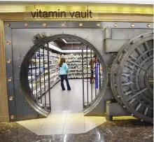  ??  ?? A historic bank has been converted into a pharmacy, where customers can enter its walk-in safe now known as the Vitamin Vault.