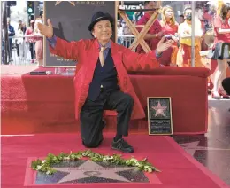  ?? MARK J. TERRILL/AP ?? Asian American actor James Hong is seen May 10 after being honored with a star on the Hollywood Walk of Fame during a ceremony in Los Angeles.