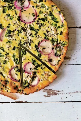  ?? CONTRIBUTE­D BY ARAN GOYOAGA ?? Ricotta and goat cheese are part of this frittata made with eggs and radishes. You could bake this in a pie crust to make a quiche, if desired.