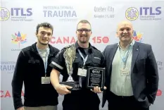  ?? SUPPLIED PHOTO ?? From the left, Robert Eliadis, son of Toronto paramedic George Eliadis who died in July, Niagara EMS paramedic Connor McCulloch, and Mike Eliadis, George Eliadis’ brother.