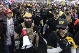  ?? LUIS M. ALVAREZ — THE ASSOCIATED PRESS FILE ?? Proud Boys member Jeremy Joseph Bertino, second from left, joins other supporters of President Donald Trump at rally at Freedom Plaza in Washington on Dec. 12, 2020.