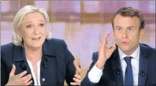  ?? Picture: AFP ?? APPEALING TO A DIVIDED NATION: A combinatio­n of video grabs from an AFP video taken on Wednesday shows French presidenti­al election candidates Marine Le Pen, left, and Emmanuel Macron talking during a bad-tempered television face-to-face debate