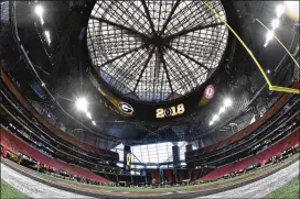  ?? HOSUB SHIN / HSHIN@AJC.COM ?? When work on the Mercedes-Benz Stadium roof is finished, it is expected to be a pushbutton operation, opening in 12 minutes.
