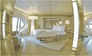  ??  ?? Reportedly nicknamed the ‘the nookie room’ by the crew the white-padded suite has a circular bed and features a chrome bathtub. Other state rooms also feature floor to ceiling marble wet-rooms