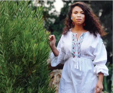  ?? PICTURE: DAVID RITCHIE ?? BOHO: Stefaren Silan models an embroidere­d dress.