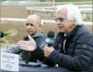  ?? DAMIAN DOVARGANES — THE ASSOCIATED PRESS ?? In this photo, Hall of Fame jockey Mike Smith, left, and Hall of Fame trainer Bob Baffert take questions about horse Justify at Santa Anita Park in Arcadia The only thing Baffert wanted to do in horse racing was win the Triple Crown. Been there, done...