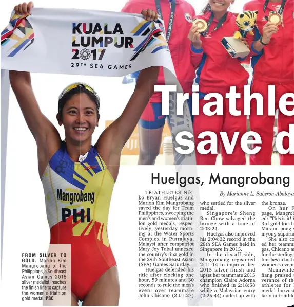  ??  ?? FROM SILVER TO GOLD. Marion Kim Mangrobang of the Philippine­s, a Southeast Asian Games 2015 silver medalist, reaches the finish line to capture the women's triathlon gold medal. PSC