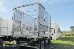  ?? Picture: JON HOUZET ?? NO VEHICLE? SAPS has been told there is no vehicle available to transport stray cattle to the pound in Alexandria, but TotT photograph­ed the truck that was specially fitted to transport cattle and kept at the Alexandria municipal works yard