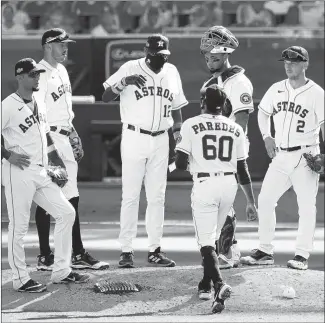  ?? JAE C. HONG/AP ?? Astros manager Dusty Baker visits the mound during Game 5 of the ALCS on Thursday in San Diego.