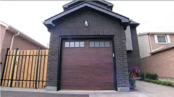  ?? ALEX SCHULDTZ/THE HOLMES GROUP ?? A garage that has been built smartly can provide much more function than a place in which to park your car.