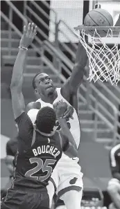  ?? CHRIS O'MEARA AP ?? Heat guard Kendrick Nunn dunks over the Raptors’ Chris Boucher on his way to 22 points on Friday night.