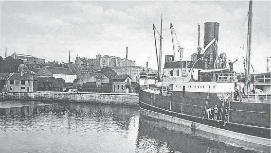  ??  ?? Today’s picture, sent in by a Broughty Ferry reader, shows Kirkcaldy Harbour. Can you spot the painters suspended from a cradle – with nothing between them and the water!