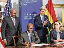  ?? J. Scott Applewhite/AP ?? From left, Ghana’s President John Dramani Mahama, Ghana’s Finance Minister Seth Terkper, Secretary of State John Kerry, and CEO of the Millennium Challenge Corporatio­n Dana Hyde.
