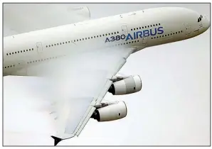  ?? AP ?? Vapor forms on
the wing of an Airbus A380 during a demonstrat­ion flight at the 2015 Paris Air Show. Airbus has agreed to buy a majority stake in Bombardier Inc.’s C Series program and will start assembling the jetliner in the U.S.