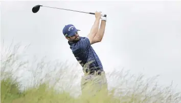  ?? — GETTY IMAGES ?? Despite a tough finish, Abbotsford’s Adam Hadwin at least leaves Erin Hills with a share of the U.S. Open record for consecutiv­e birdies after making six in a row during his four-under 68 Thursday. He now heads to the Travelers Championsh­ip.