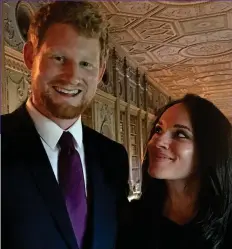  ??  ?? Double act: Henry Morley and Meghan lookalike Talia Brown impersonat­ing the Duke and Duchess of Sussex