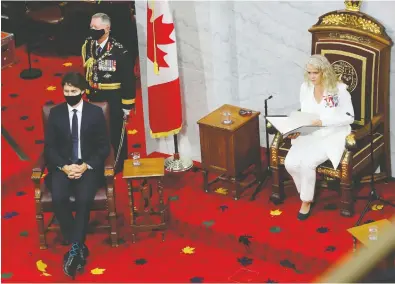  ?? PATRICK DOYLE / REUTERS FILES ?? Gov. Gen. Julie Payette delivers the recent throne speech in the Senate as Prime Minister Justin Trudeau sits nearby.