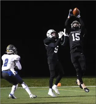  ?? PETE BANNAN — MEDIANEWS GROUP ?? Strath Haven defender Aiden Sutherland, right, intercepts a pass late in the game as the Panthers ice a 34-6victory over Academy Park Friday night at King field.