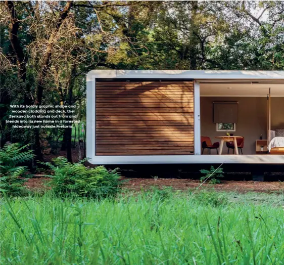  ??  ?? With its boldly graphic shape and wooden cladding and deck, the Zenkaya both stands out from and blends into its new home in a forested
hideaway just outside Pretoria.
