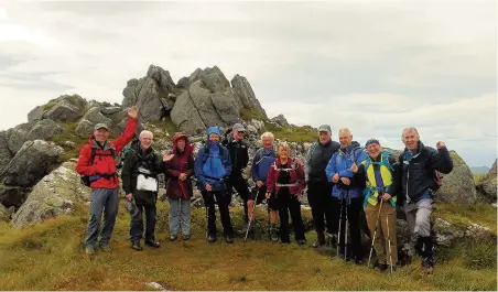  ??  ?? On a high Duncanrig Ramblers on The Schil