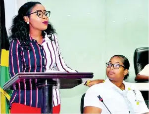  ?? CONTRIBUTE­D ?? Santana Morris (left), Jamaica’s youth ambassador to the United Nations, speaking at a Youth Month Leadership Forum hosted by the St James Municipal Corporatio­n last November. Looking on is Ayanna Waite, a sixth-form student at Mount Alvernia High School.