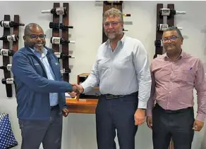  ?? SUPPLIED ?? From left: Western Cape Department of Agricultur­e head Dr Mogale Sebopetsa, Willie Jacobs, CEO of Potatoes South Africa, and Darryl Jacobs, deputy director general of agricultur­e and support services at the department at the signing of the memorandum.