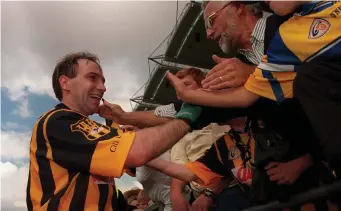  ??  ?? DJ Carey of Kilkenny celebrates with supporters following the All-Ireland Senior Hurling Championsh­ip Semi-Final match between Kilkenny and Clare on August 15th 1999. Pic: Damien Eagers/SPORTSFILE.