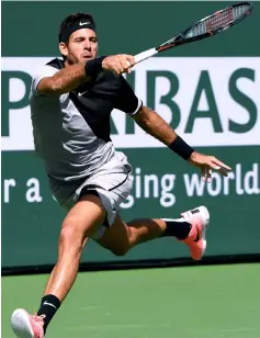  ??  ?? Del Potro plays a running forehand in his victory over Federer in the ATP final during the BNP Paribas Open at the Indian Wells Tennis Garden in Indian Wells, California. — AFP photo