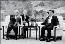  ?? AP PHOTO/ANDY WONG, POOL ?? U.S. SECRETARY OF STATE REX TILLERSON (left) chats with China’s President Xi Jinping during a meeting at the Great Hall of the People in Beijing on Saturday.