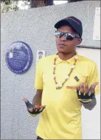  ??  ?? Siboniso Dhlamini talks to the group outside Archbishop Desmond Tutu’s old home in Vilikazi Street.