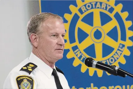  ?? JASON BAIN EXAMINER ?? Newly minted city police Chief Scott Gilbert addresses city Rotarians at theHoliday Inn on Monday.