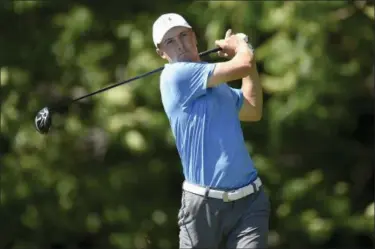  ?? JOHN WOIKE — HARTFORD COURANT VIA AP ?? Jordan Spieth watches his tee shot on the 12th hole during the Travelers Championsh­ip June 23.