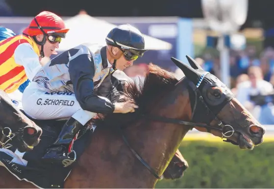  ?? Picture: GETTY IMAGES ?? Jockey Glyn Schofield guides Houtzen to a fighting win in the Group 3 PJ Bell Stakes at Randwick .