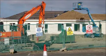  ??  ?? The demolition under way at the weekend.