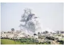  ?? MOHAMAD ABAZEED/AFP ?? Smoke billows after an airstrike Saturday on a rebel-held area in the southern Syrian city of Daraa.