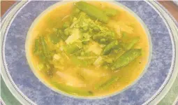  ?? WORTHINGTO­N/TNS DIANE ROSSEN ?? This soup is best made just before serving so the vegetables don’t overcook.