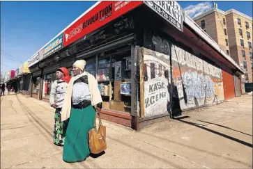  ?? Photograph­s by Carolyn Cole Los Angeles Times ?? THE CENSUS BUREAU says there are about 90,000 Liberians in the U.S. Many live in Staten Island, N.Y.