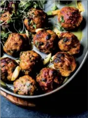  ?? PHOTO COURTESY ALANNA TAYLOR-TOBIN ?? Spiced with cumin, garlic and ginger, these chicken meatballs from Asha Shivakumar’s new “Masala & Meatballs” cookbook* (Page Street Publishing Co., 2018) are tender and delicious.