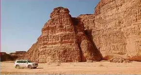 ??  ?? A four-wheel drive vehicle on a desert safari.