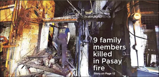  ?? MIGUEL DE GUZMAN ?? A police investigat­or sifts through the debris of a house destroyed by fire in Maricaban, Pasay City early yesterday. Nine persons, all relatives, died in the blaze.