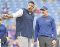  ?? Adrian Kraus / Associated Press ?? Rival head coaches Mike Vrabel, left, of the Titans and Sean Mcdermott of the Bills are set to lead unbeaten teams into Tuesday night’s game in Nashville, Tenn. Tennessee is 3-0, but has not played since Sept. 27. Buffalo is 4-0 this season.