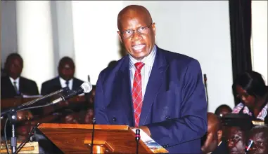  ??  ?? Finance and Economic Developmen­t Minister Patrick Chinamasa presents his 2018 National Budget proposals in Parliament yesterday
